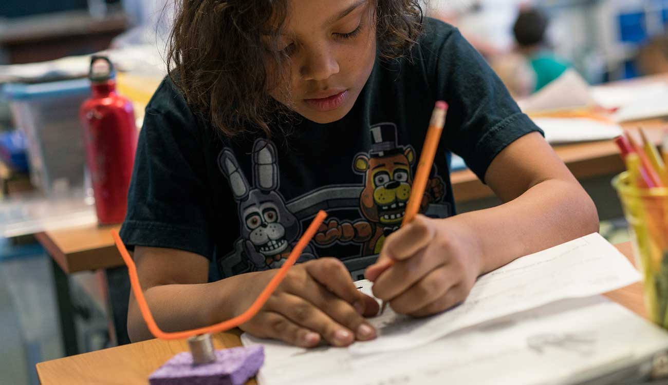 Young child working on schoolwork
